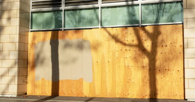 Storefront boarded up to protect the property during reconstruction | ATI Restoration