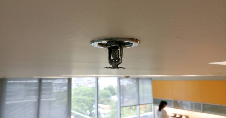 Fire sprinkler on ceiling of a commercial property | ATI Restoration