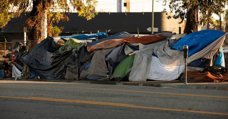 Homeless encampment on city sidewalk | ATI Restoration