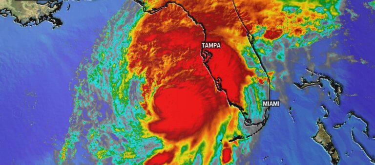 Satellite image showing a weather system approaching the Florida coast, with Tampa and Miami labeled.