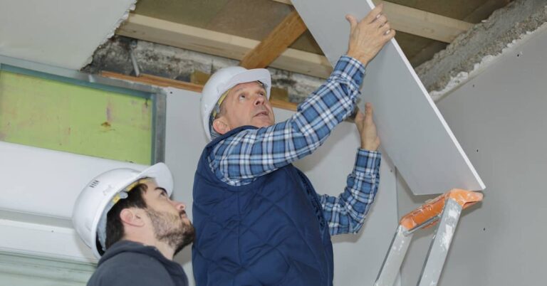 Contractors assessing building damage | ATI Restoration