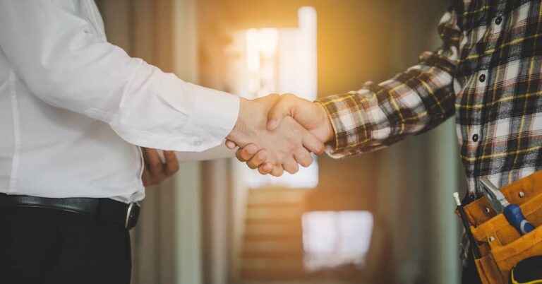 Property owner shaking hands with IICRC Certified contractor | ATI Restoration