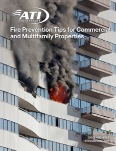 A fire engulfing a multifamily building.